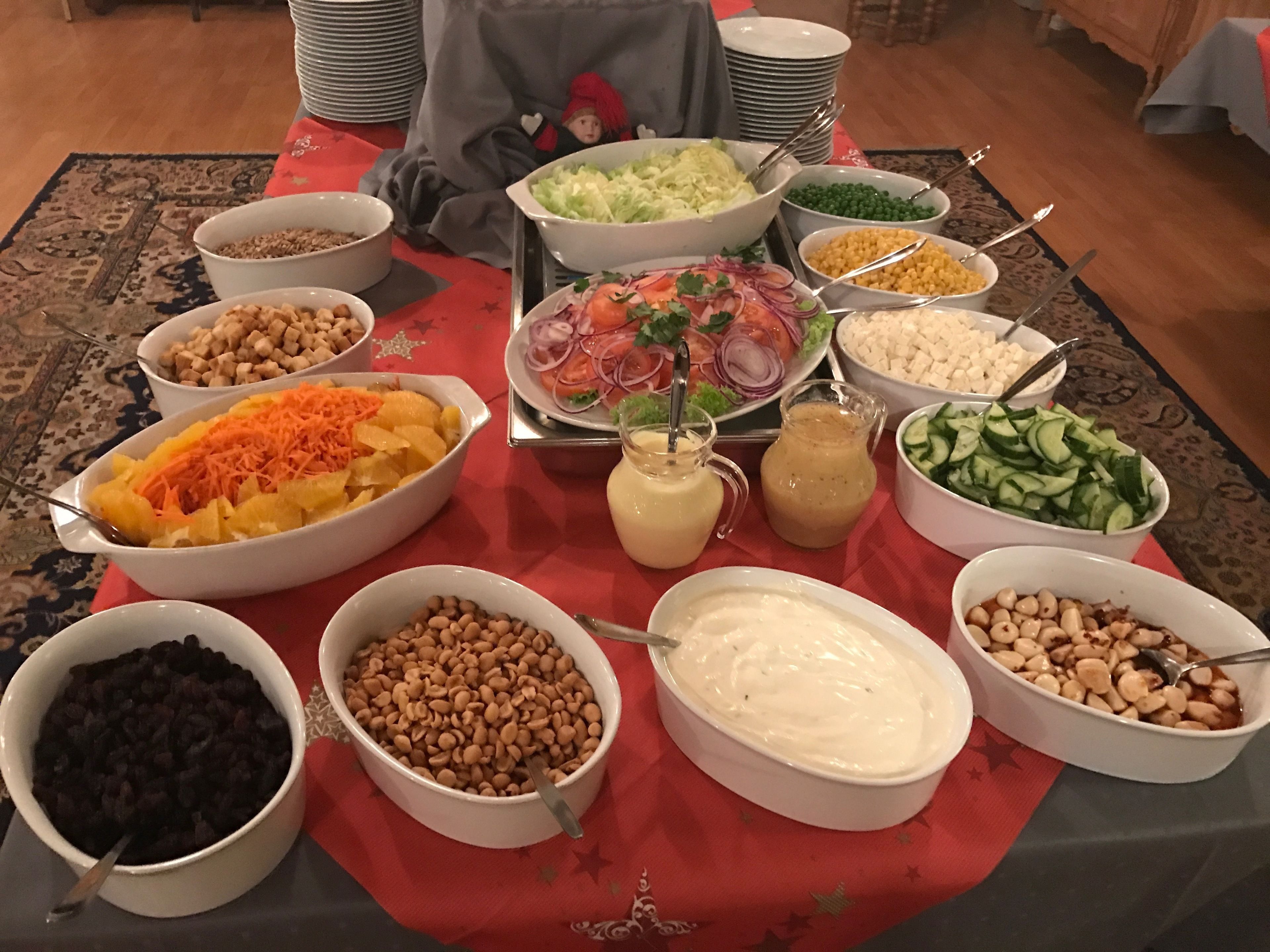A table with various food items and condiments.