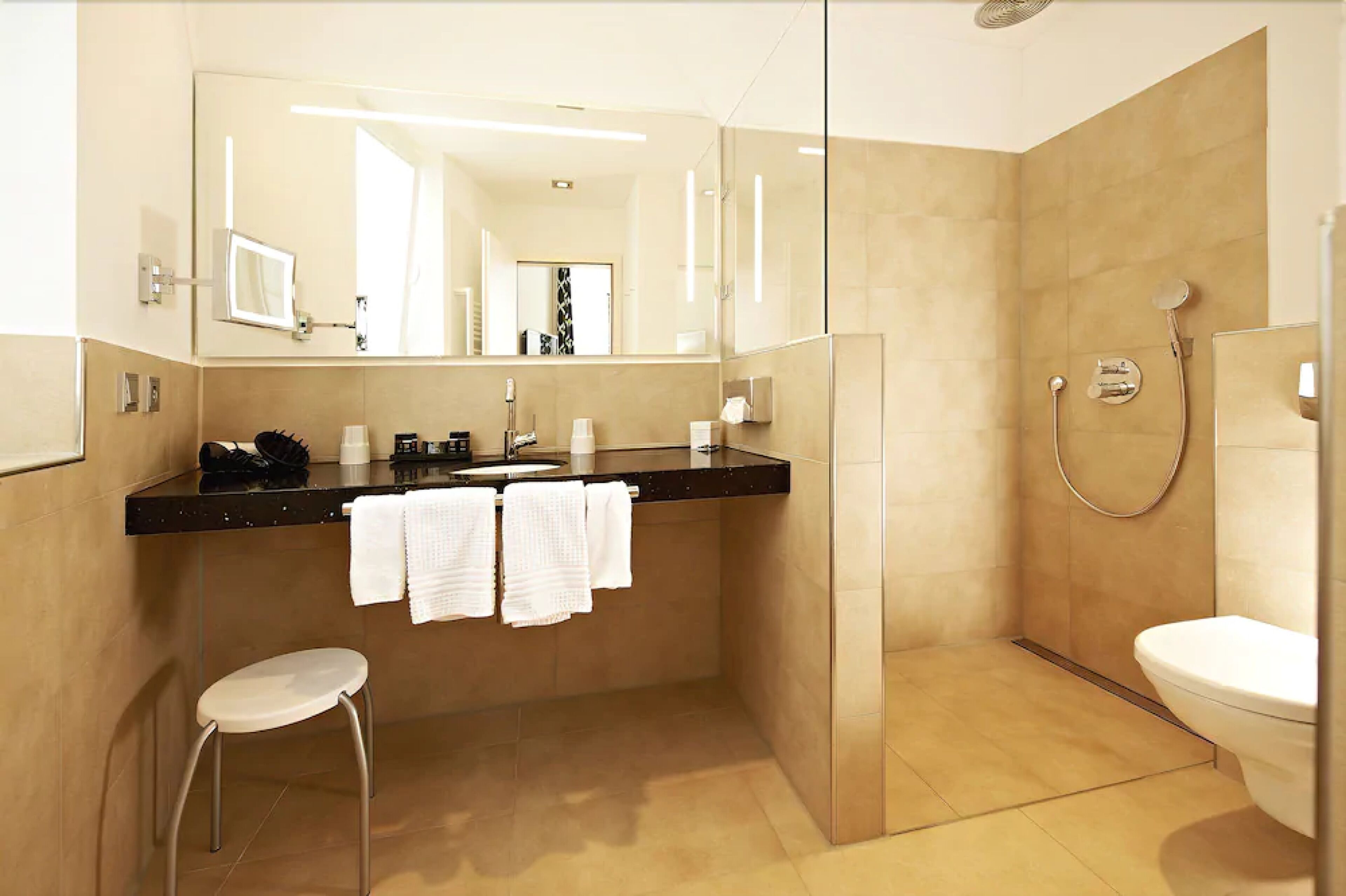 hair dryer, bathrobes, slippers, towels