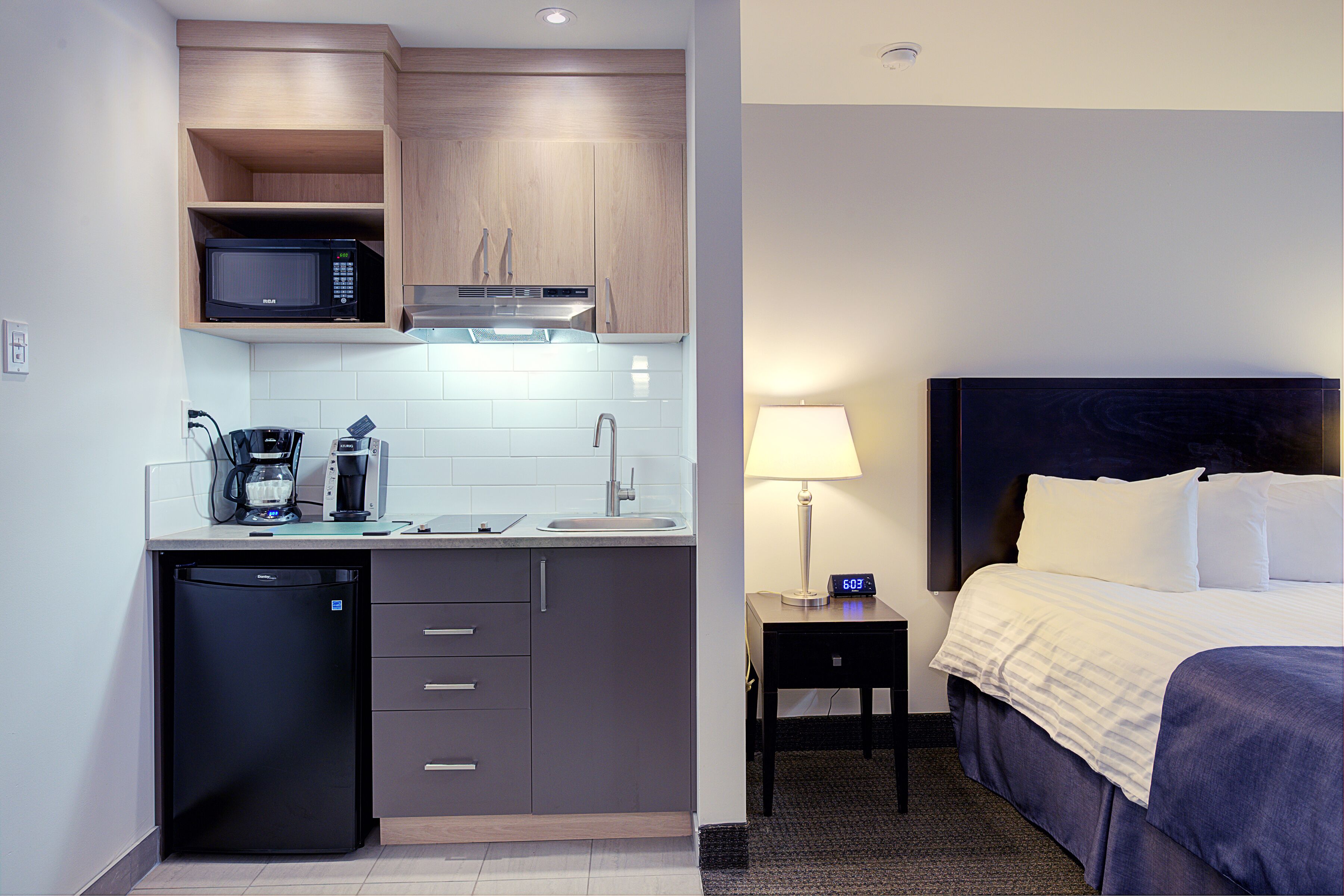 fridge, coffee/tea maker, electric kettle, dining tables