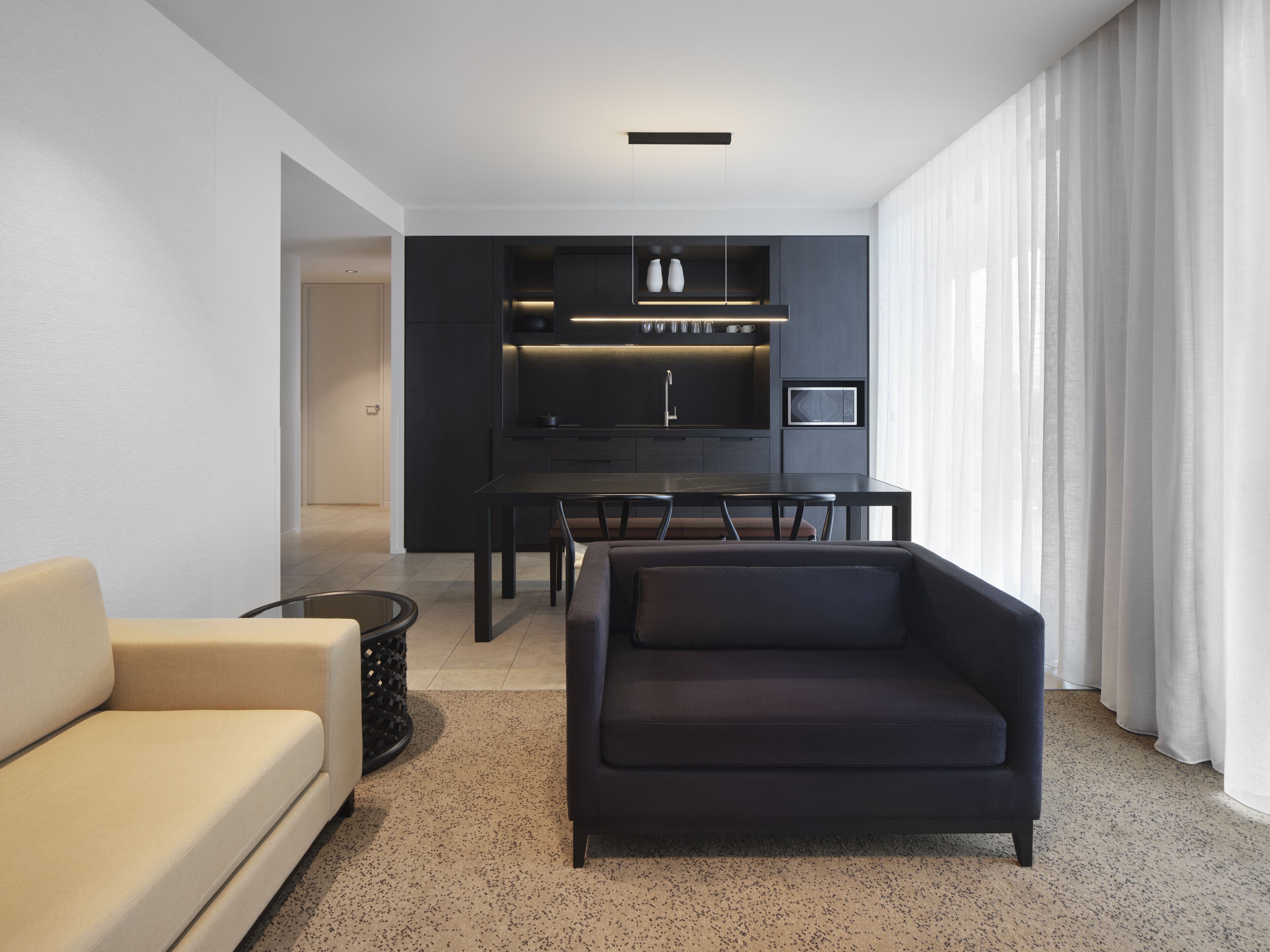 luxury two bedroom apartment | living area | 48-inch lcd tv with digital channels, tv