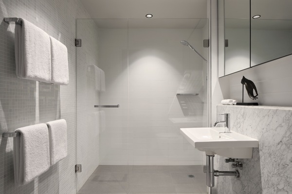 Shower, designer toiletries, hair dryer, bathrobes