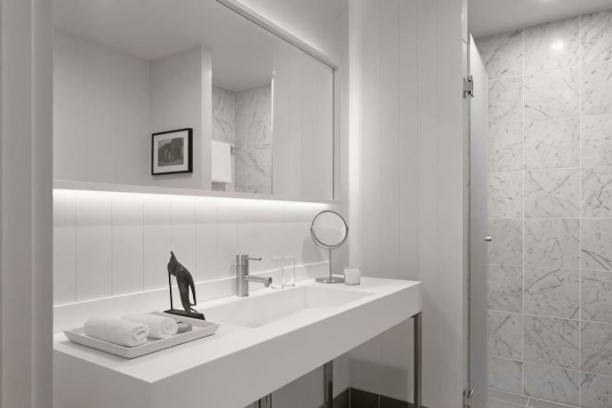 Bathroom | Shower, designer toiletries, hair dryer, bathrobes