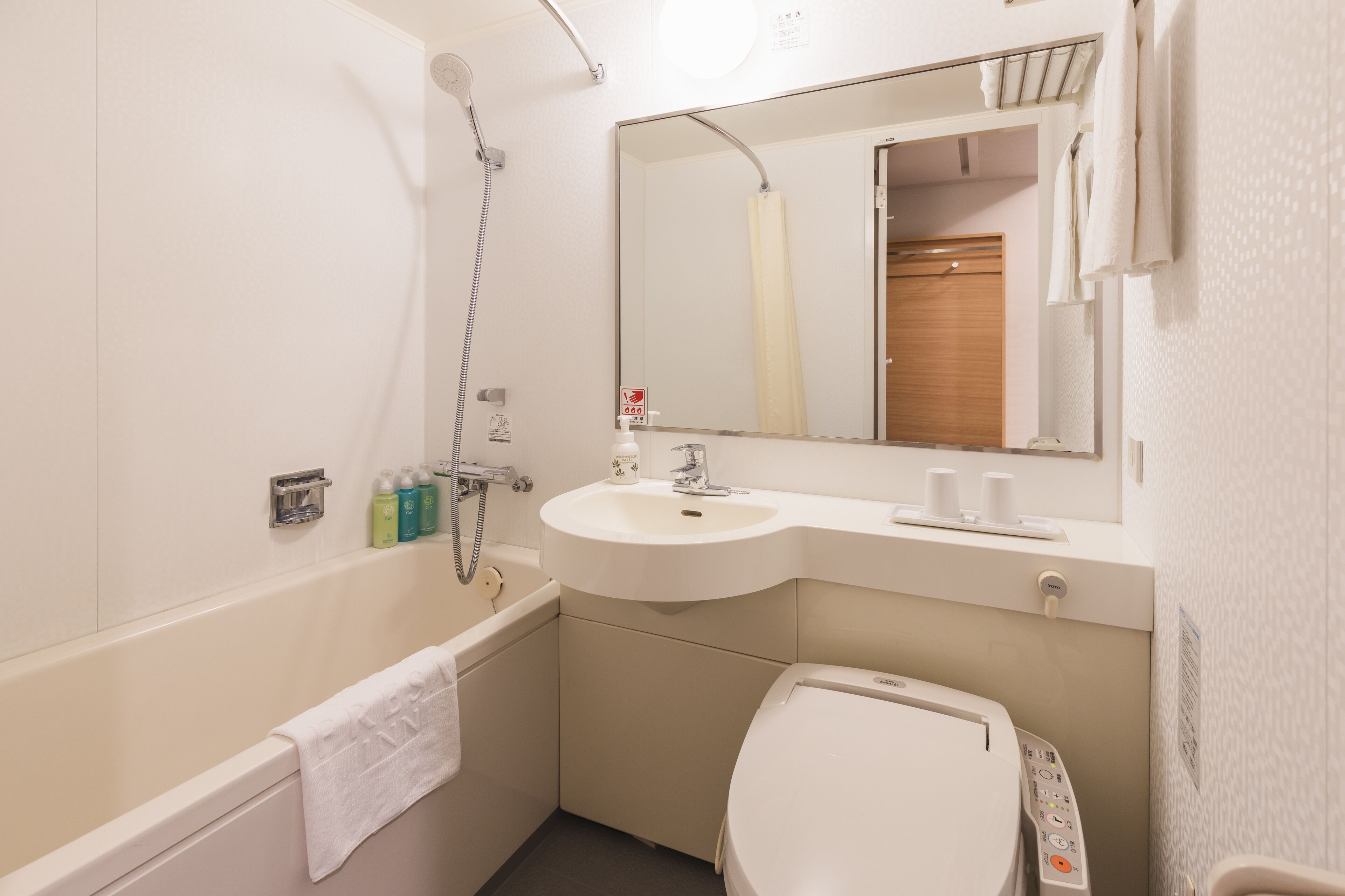 premium bedding, down duvets, desk, blackout curtains