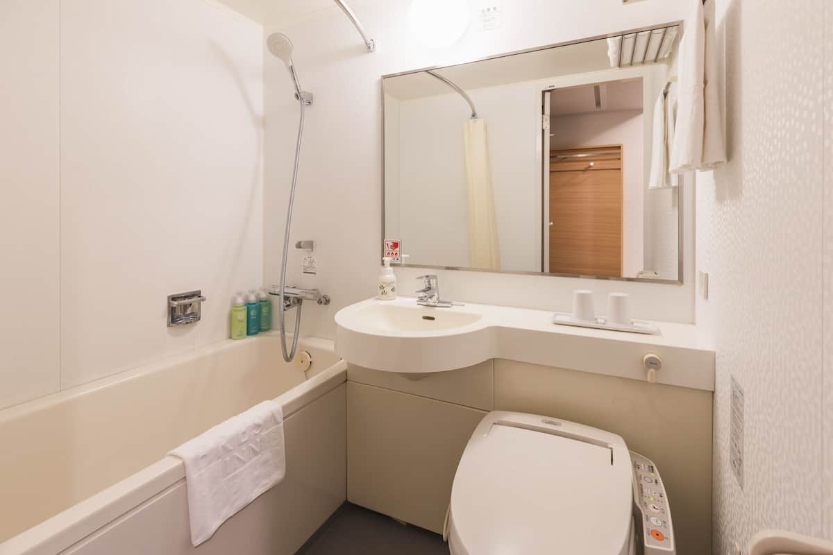 premium bedding, down duvets, desk, blackout curtains