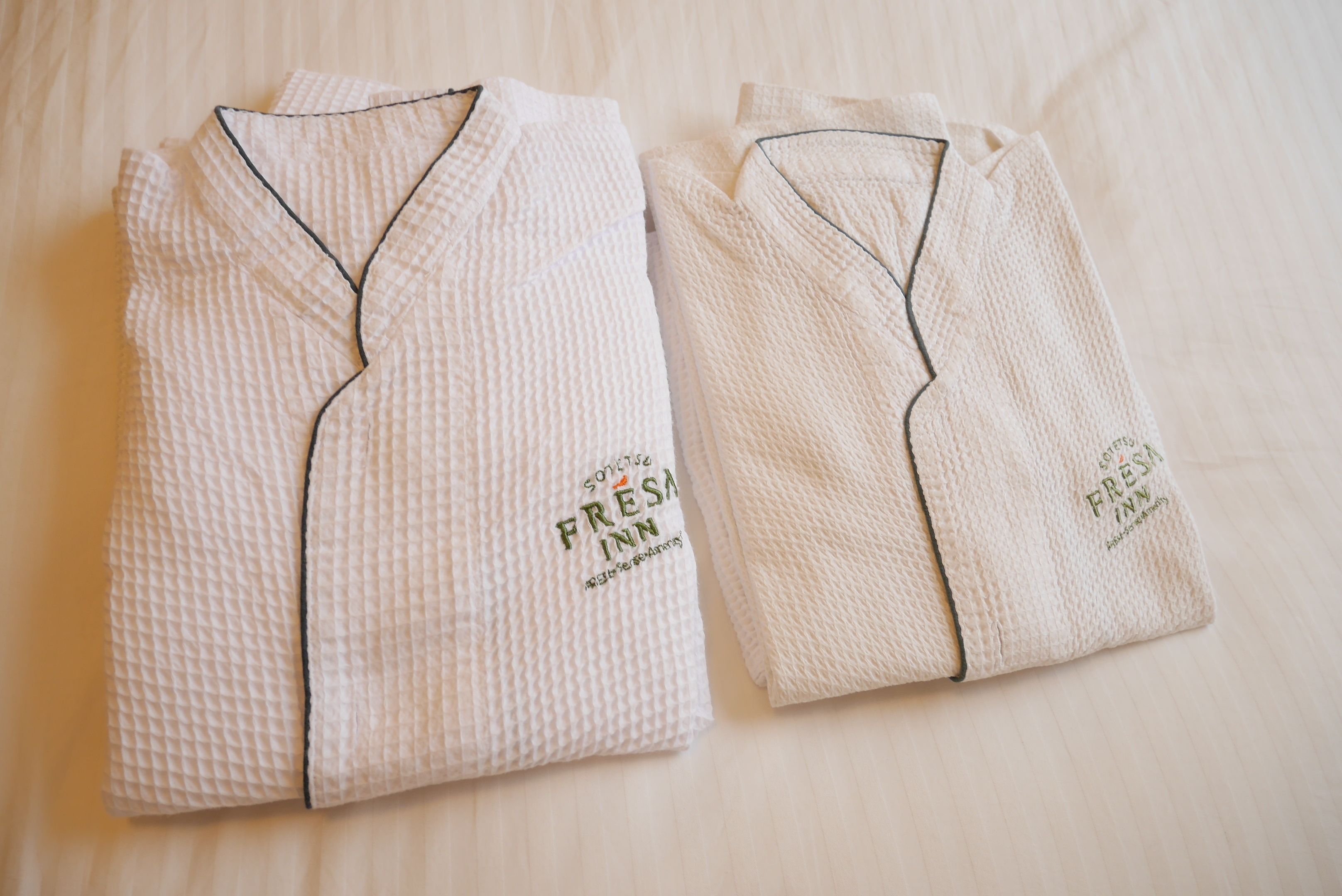 premium bedding, down duvets, desk, blackout curtains