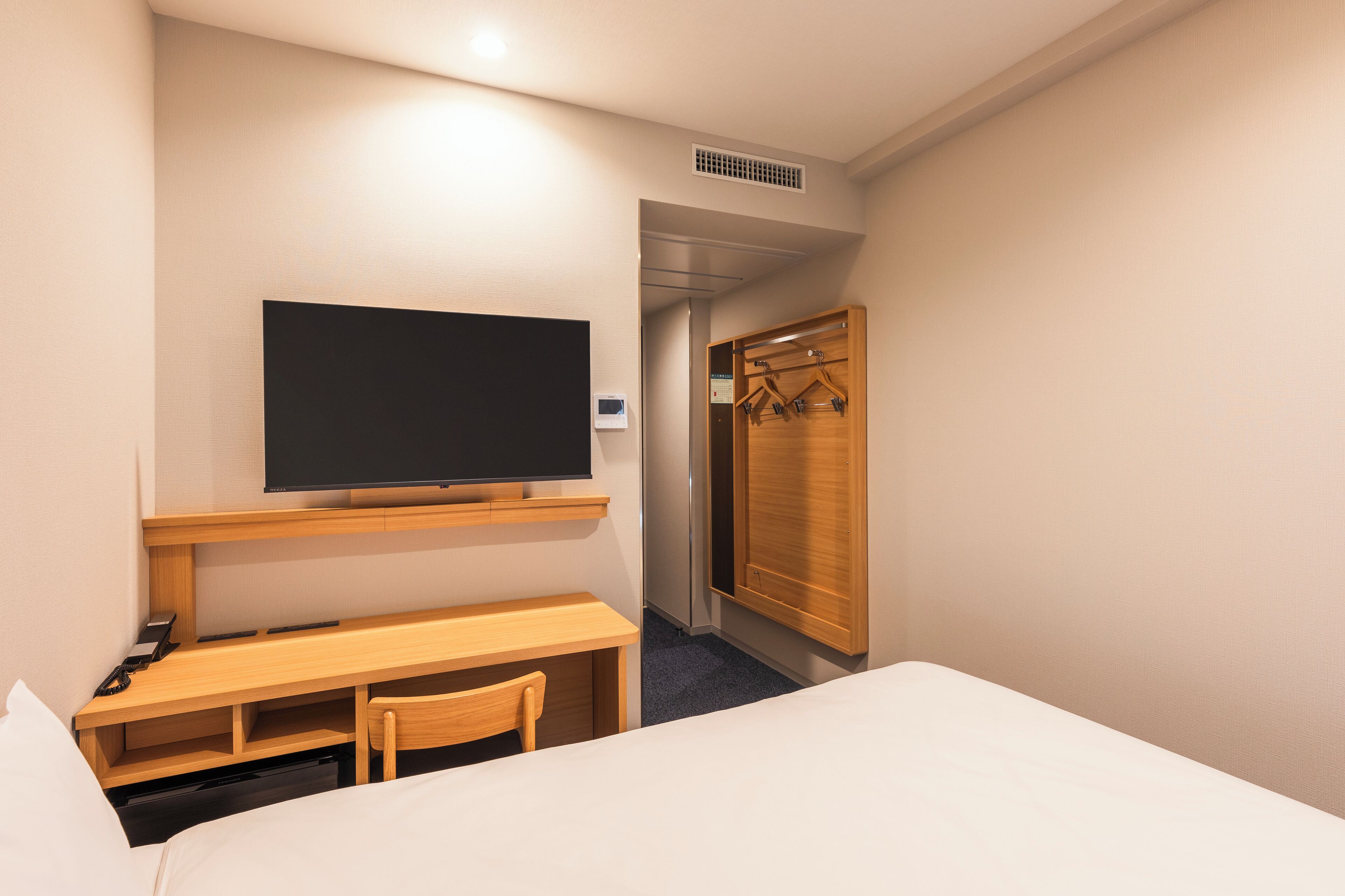 down duvets, desk, blackout curtains, iron/ironing board