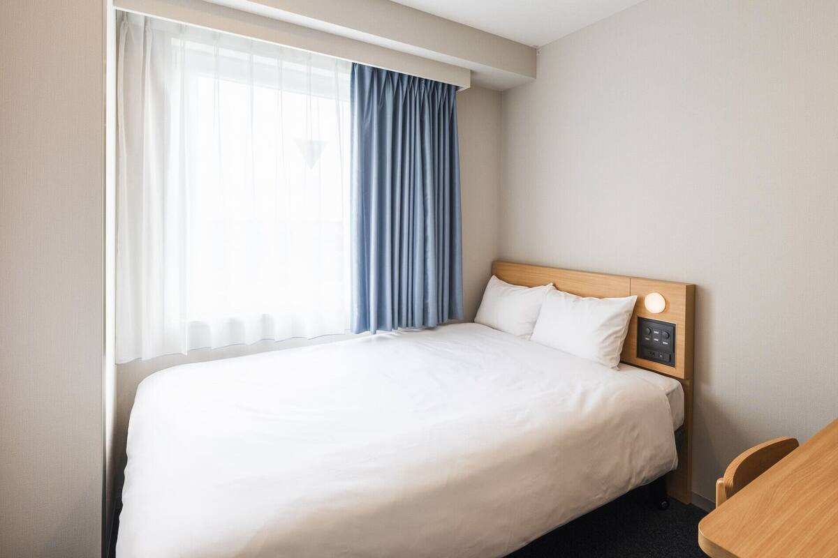 Down comforters, desk, blackout drapes, iron/ironing board (on request)