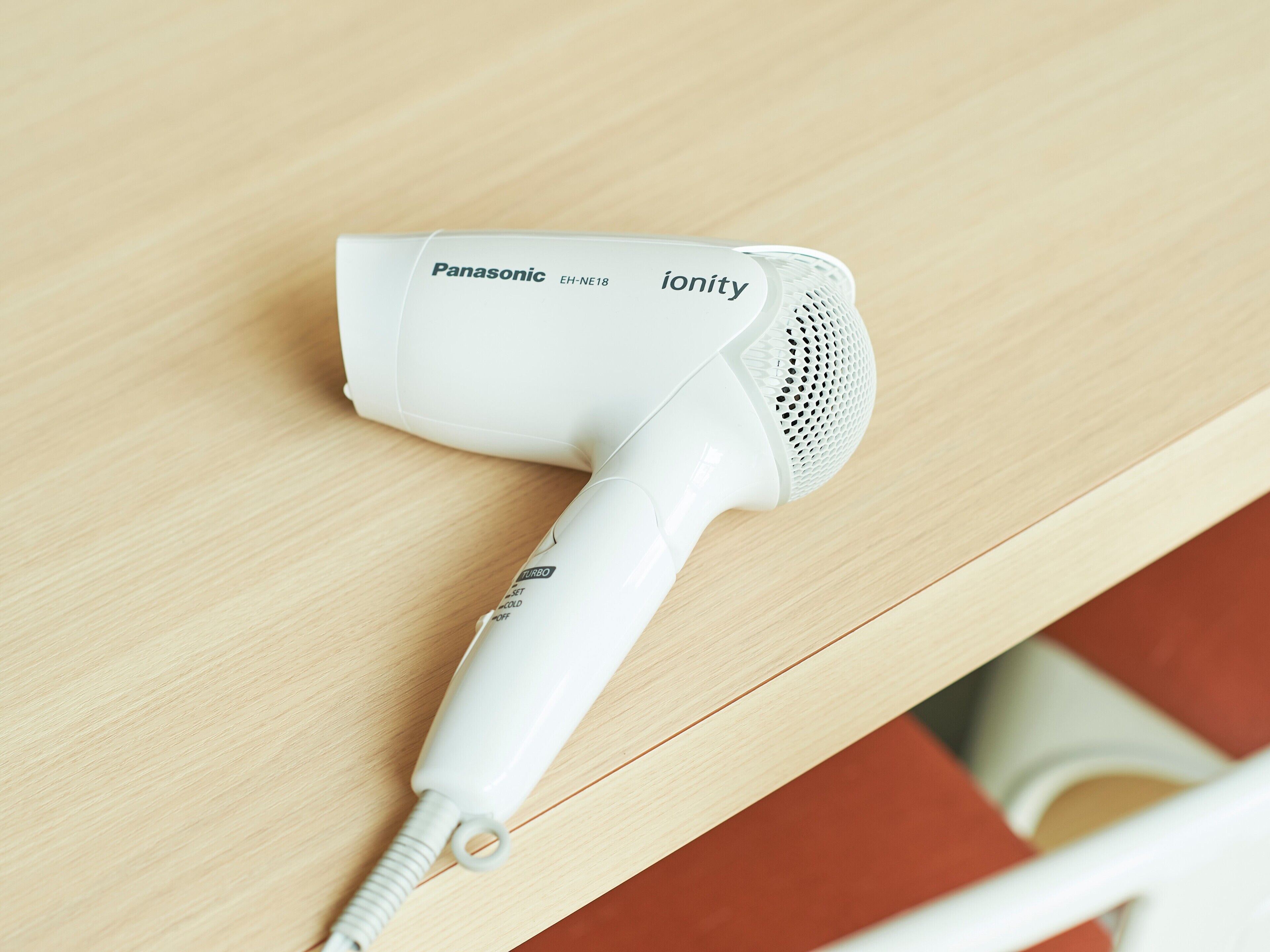 down duvets, desk, blackout curtains, iron/ironing board