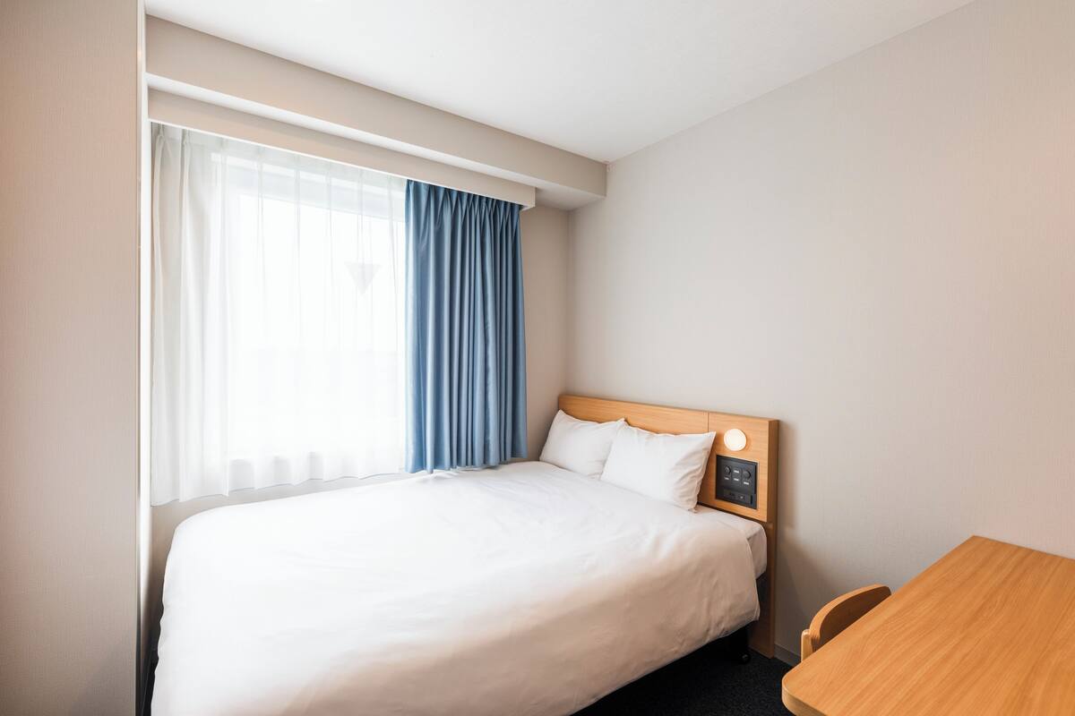 Down comforters, desk, blackout drapes, iron/ironing board (on request)