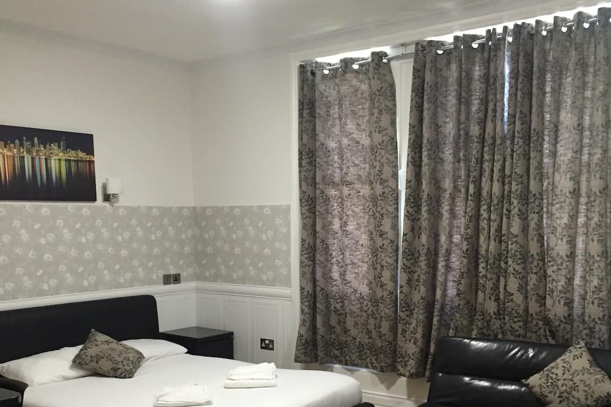 Superior studio (Family) | Een strijkplank/strijkijzer, gratis babybedden, gratis wifi, beddengoed