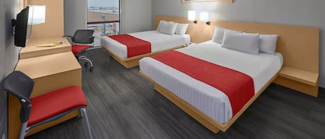 Down duvets, desk, iron/ironing board, free cots/infant beds