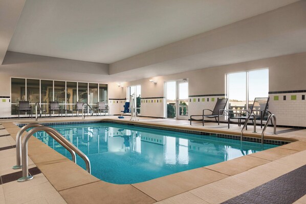 Indoor pool, open 8:00 AM to 10:00 PM, pool loungers