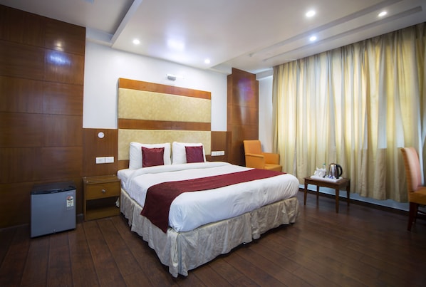 Habitación Deluxe | Ropa de cama de alta calidad y caja de seguridad en la habitación