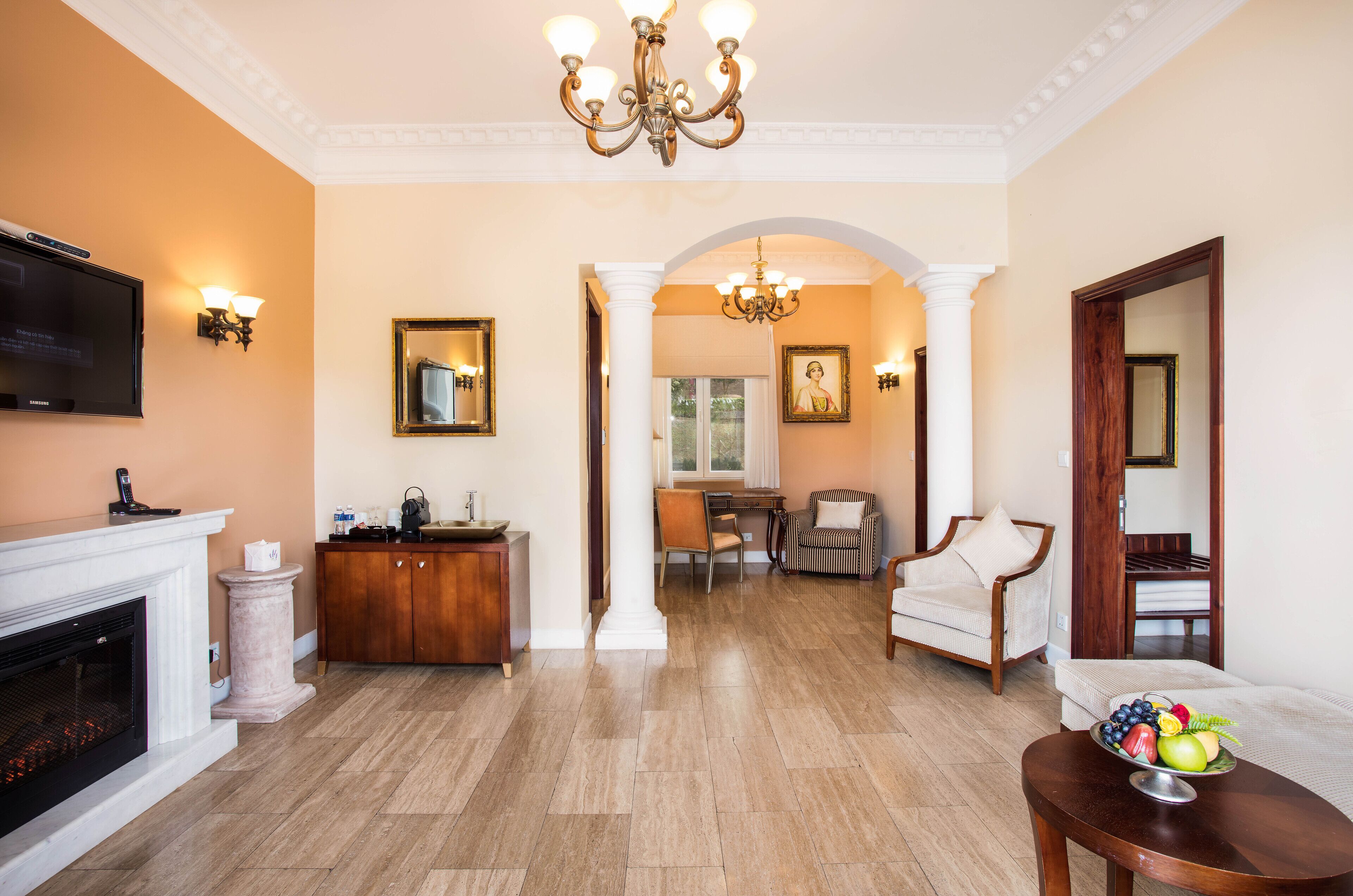 junior suite garden view villa | living area | 43-cm flat-screen tv with digital channels, fireplace