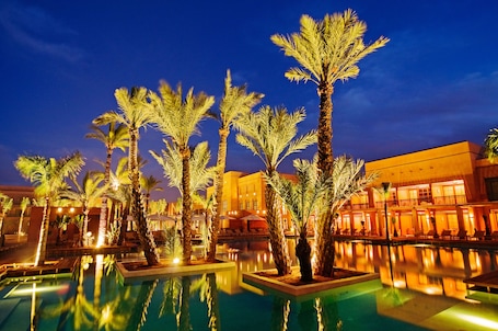 2 outdoor pools, open 9:00 AM to 7:00 PM, pool umbrellas, sun loungers