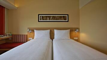 Premium bedding, memory-foam beds, minibar, in-room safe