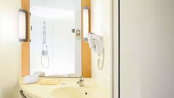 Shower, eco-friendly toiletries, hair dryer, slippers
