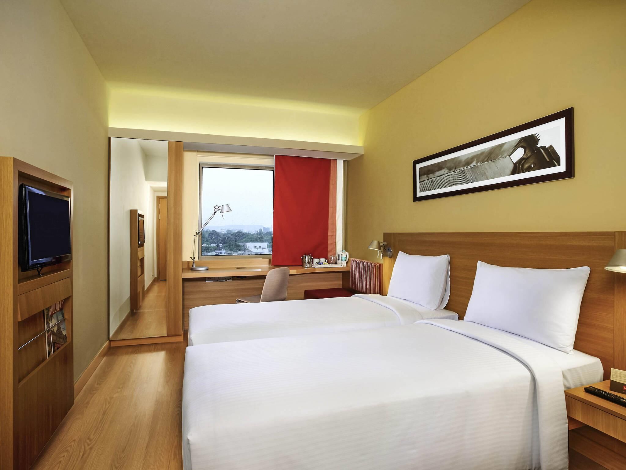 Premium bedding, memory foam beds, minibar, in-room safe