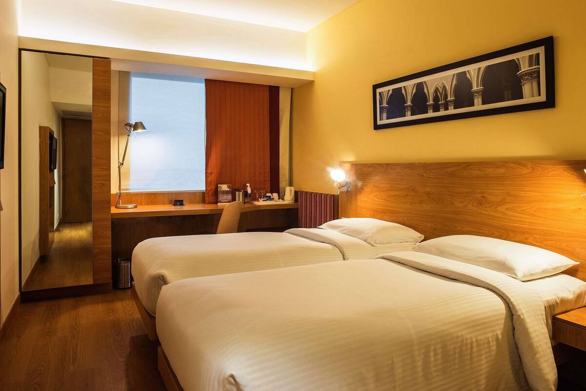 Superior Twin kamer, 2 eenpersoonsbedden | Luxe beddengoed, een minibar, een kluis op de kamer, een bureau