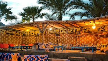 3 bars/lounges, poolside bar, beach bar