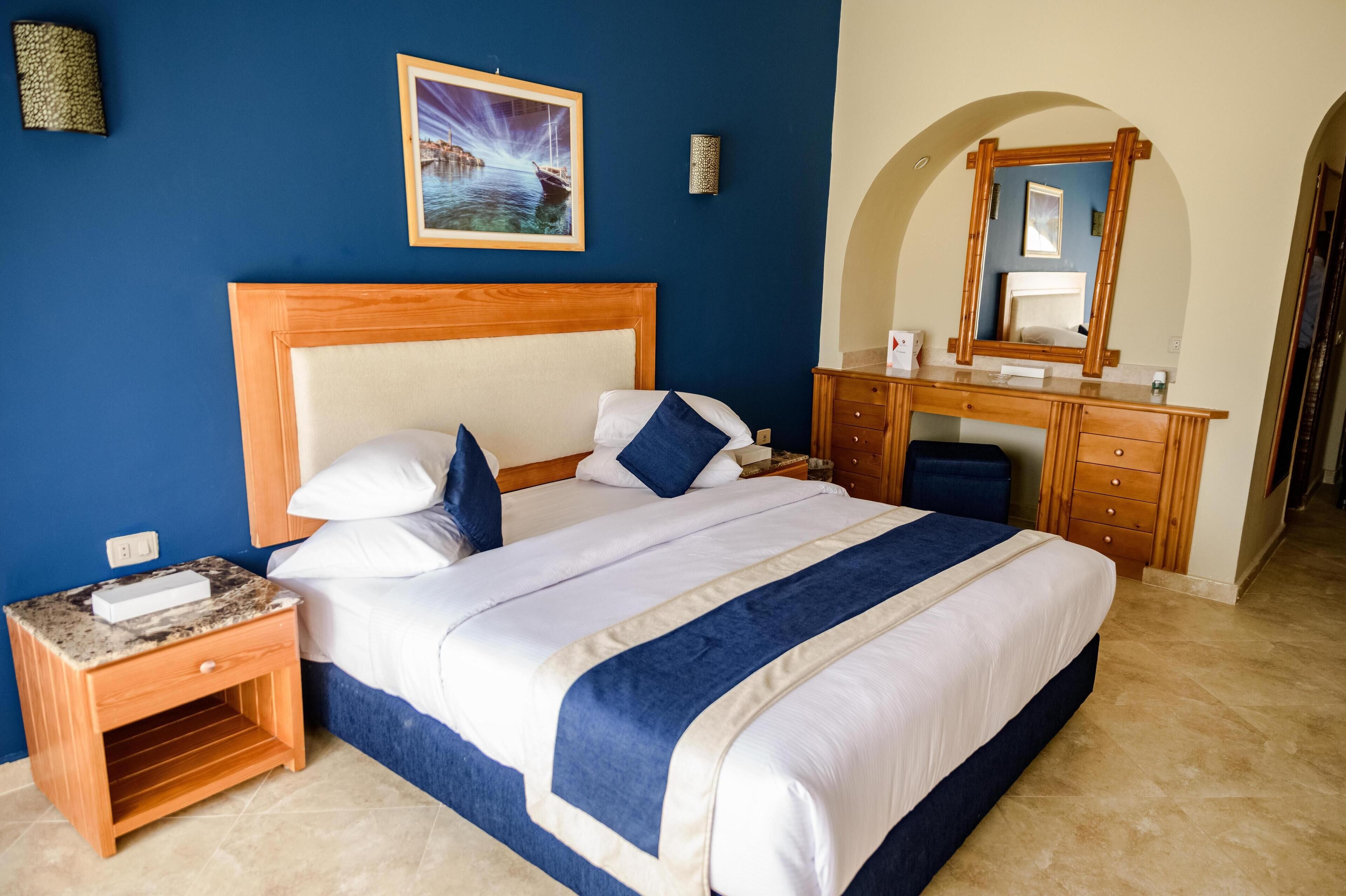 スタンダード ダブルルーム パーシャルシービュー | ミニバー、デスク、アイロン / アイロン台、可動式ベッド