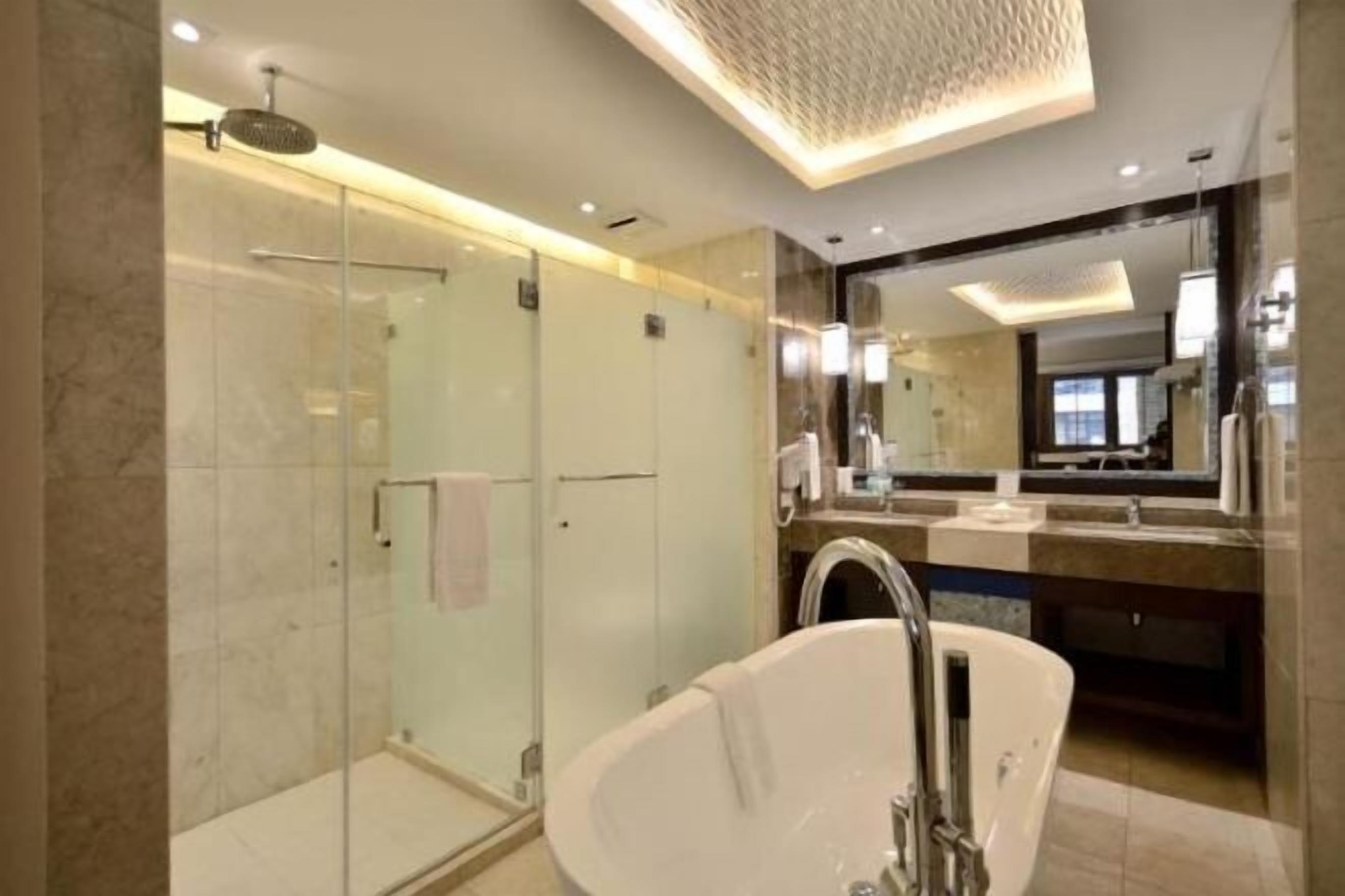 Shower, free toiletries, hair dryer, slippers