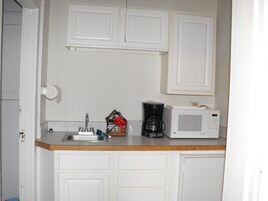 Deluxe Room, 1 Queen Bed, River View | Private kitchen | Shared fridge, microwave