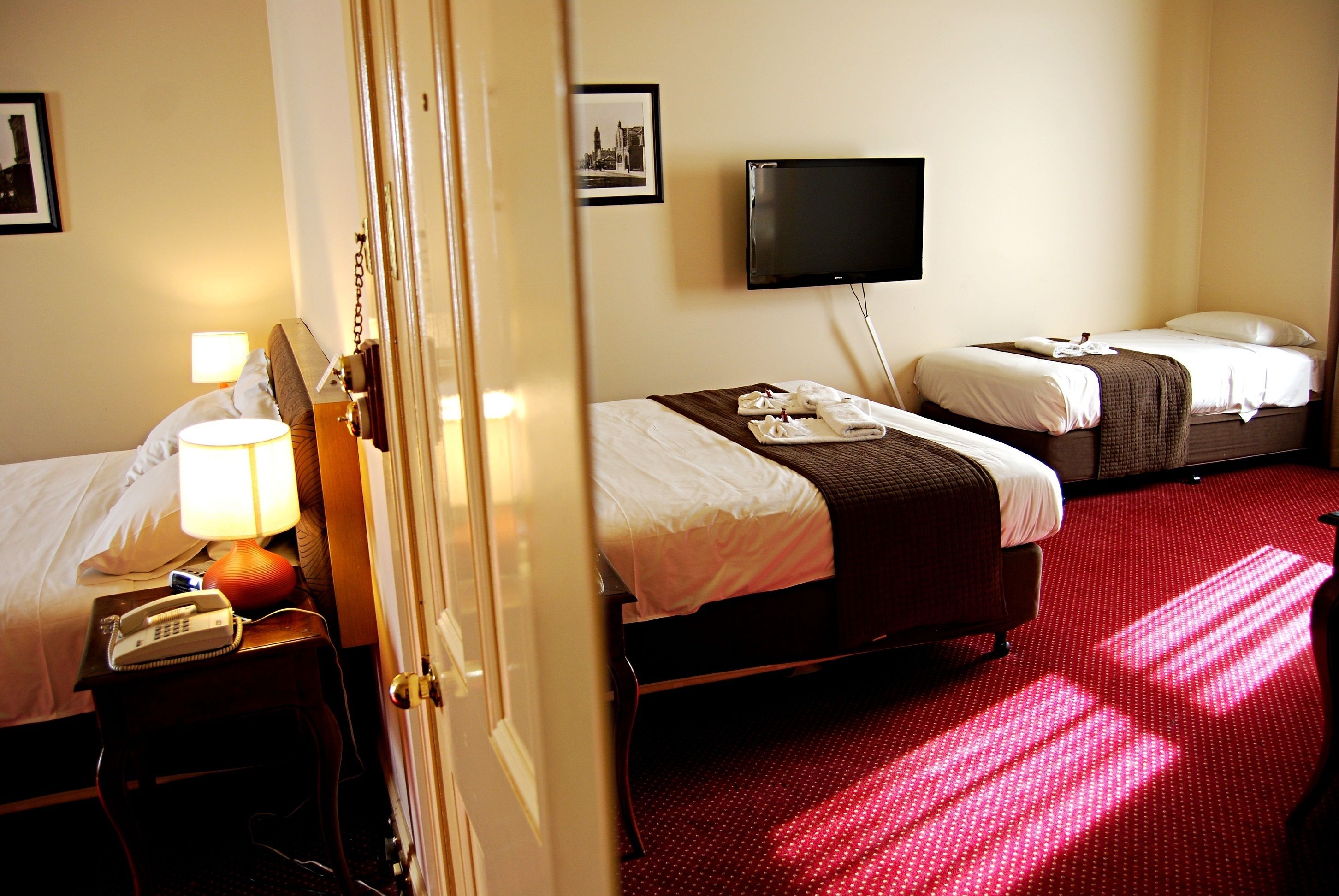 family room | desk, blackout curtains, iron/ironing board, free wifi