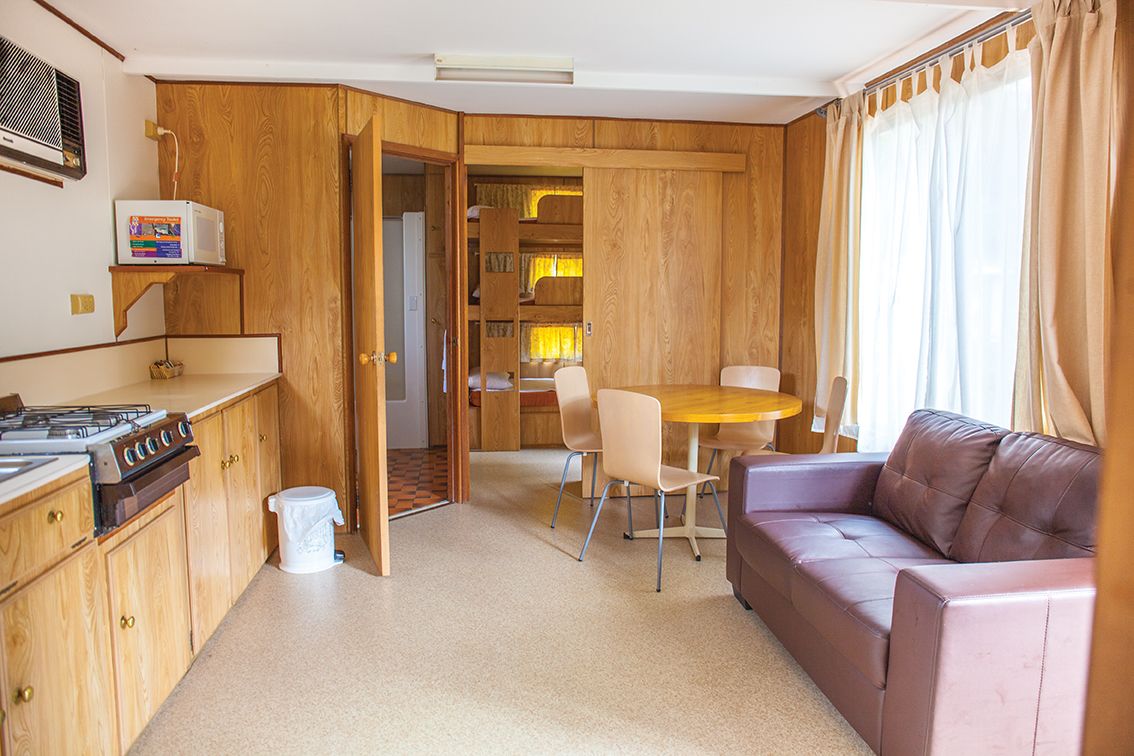 standard cabin, 2 bedrooms | living area | 32-inch flat-screen tv with digital channels, tv, dvd player