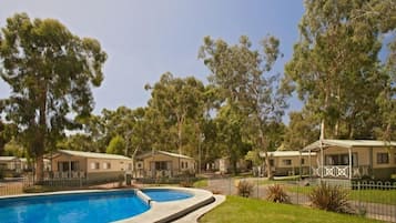 Outdoor pool, pool umbrellas, sun loungers