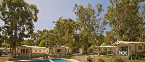 Outdoor pool, pool umbrellas, sun loungers