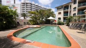 Outdoor pool, pool umbrellas, pool loungers