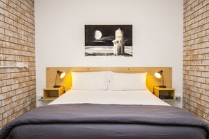 Blackout curtains, iron/ironing board, free WiFi, bed sheets