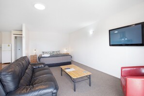 Comfort Apartment, 1 Bedroom | Living area | 42-inch LED TV with digital channels, TV, DVD player - Garden City Motel (Christchurch)