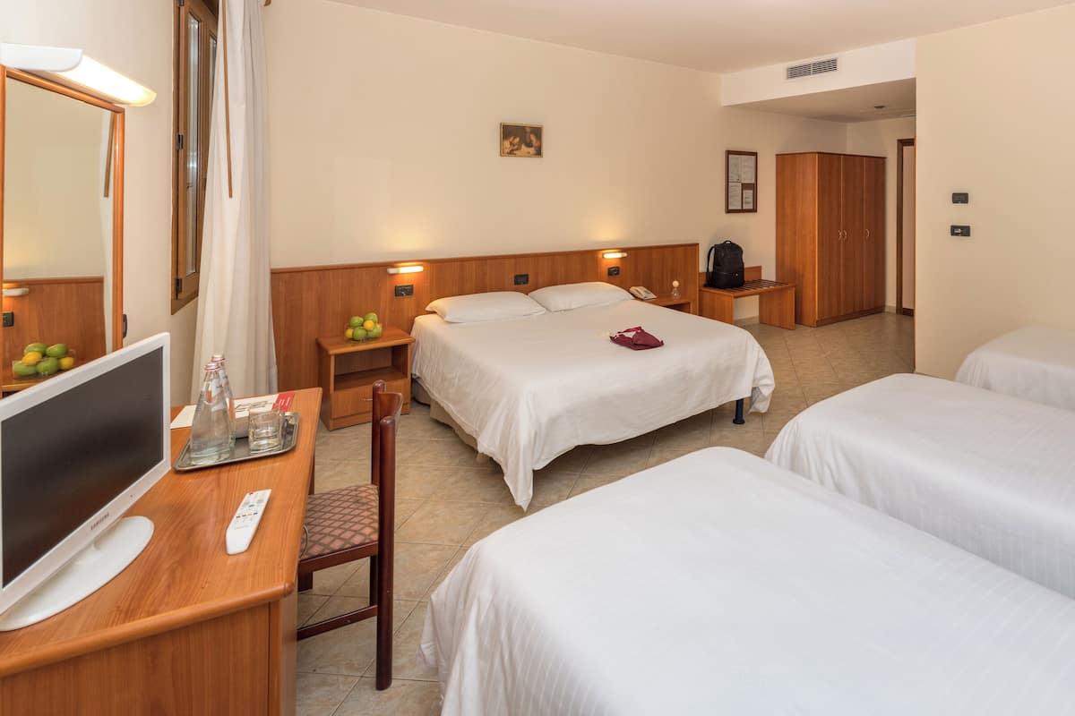 Standard Quadruple Room | In-room safe, desk, iron/ironing board, free WiFi