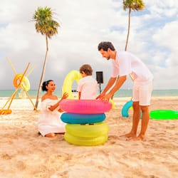 On the beach, beach umbrellas, beach towels, beach bar