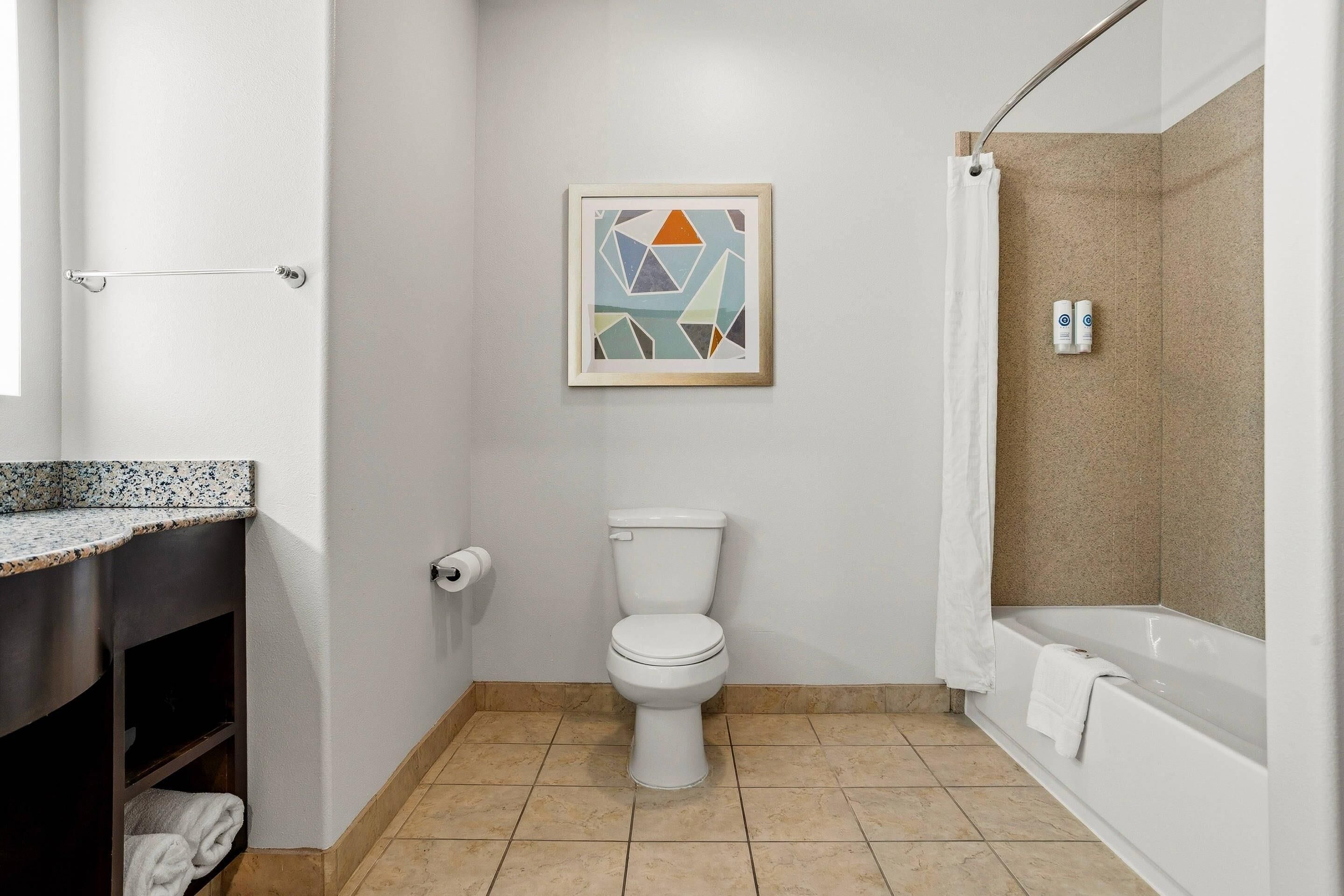 Suite, 1 King Bed, Non Smoking, Separate Seating Area and Wet Bar | In-room safe, desk, blackout curtains, iron/ironing board
