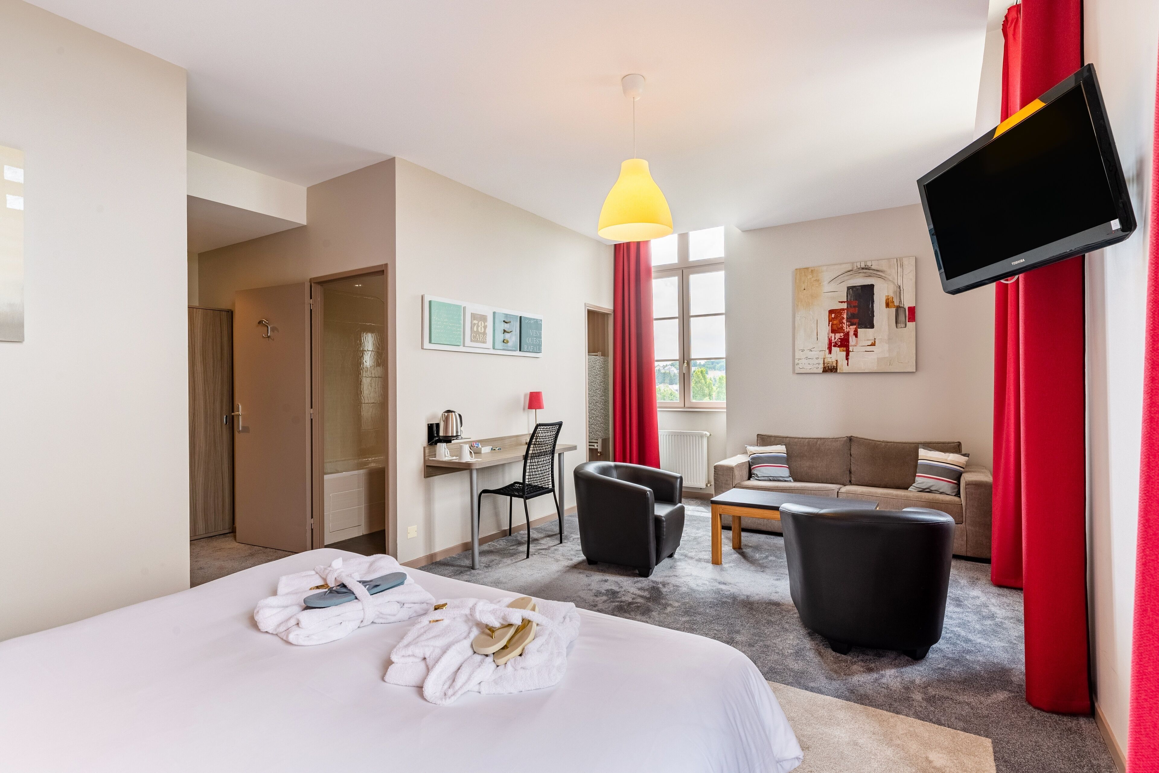 Premium bedding, desk, blackout drapes, soundproofing