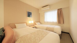 A hotel room with two beds, a nightstand with lamps, an air conditioner, a window with curtains, and a wall-mounted picture. - Hotel Famy Inn Kinshicho (Tokyo)