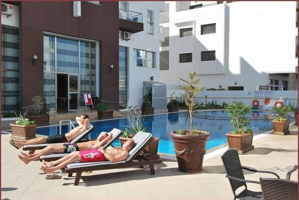 Outdoor pool, sun loungers