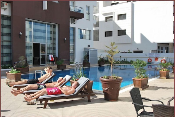 Outdoor pool, pool loungers