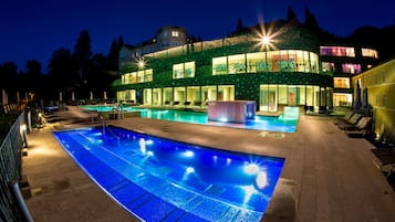 Indoor pool, outdoor pool, pool umbrellas
