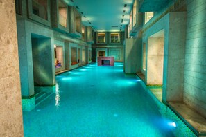 Indoor pool, outdoor pool, pool umbrellas