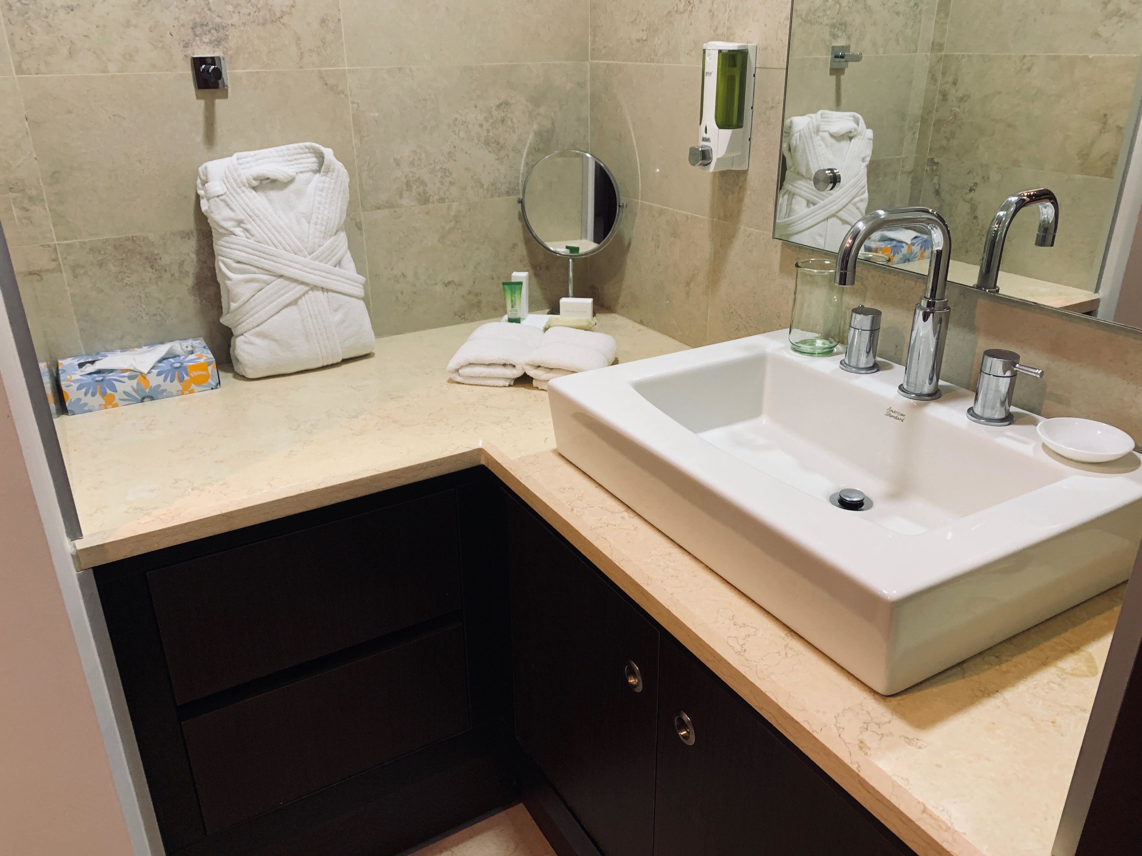 junior studio suite | bathroom | shower, rainfall showerhead, eco-friendly toiletries, hair dryer