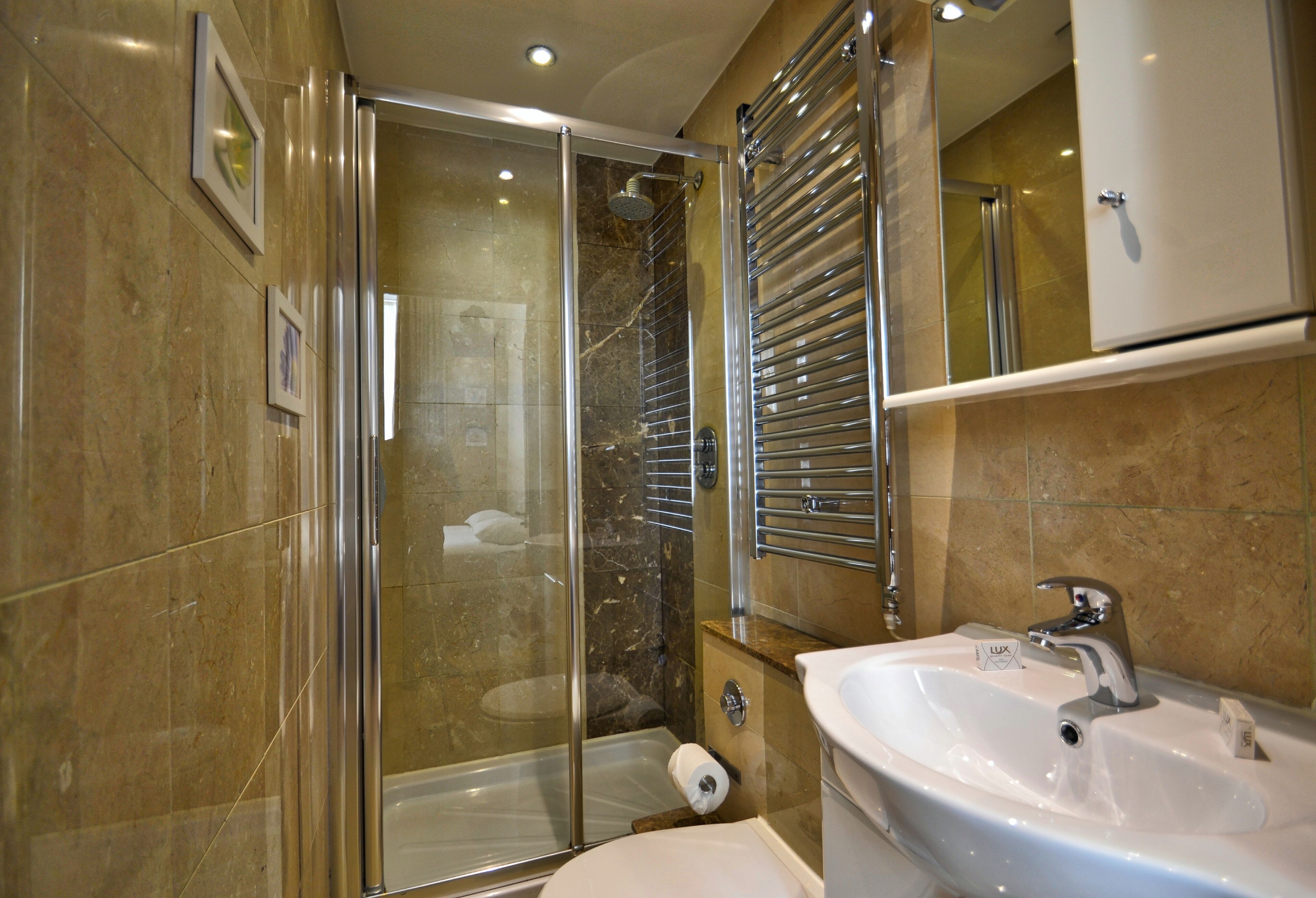 Shower, free toiletries, hair dryer, towels