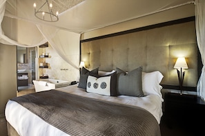 Habitación ejecutiva con 1 cama matrimonial o 2 individuales | Ropa de cama de alta calidad y caja de seguridad en la habitación