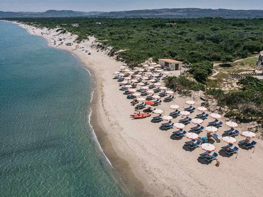 On the beach, sun-loungers, beach umbrellas