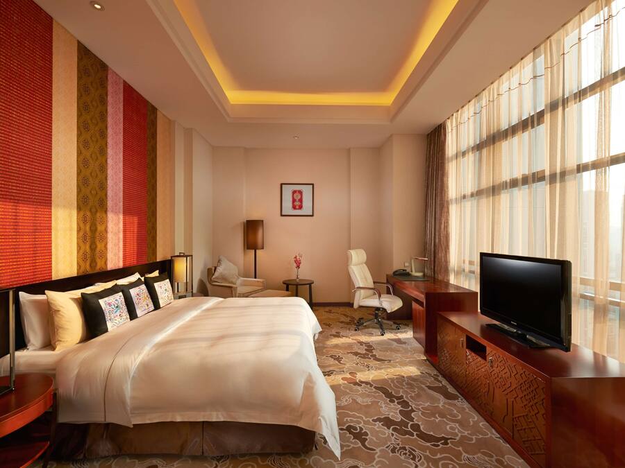 Premium bedding, down duvets, pillow-top beds, minibar