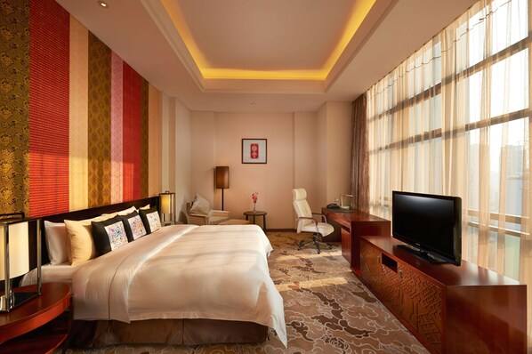 Ropa de cama de alta calidad, edredón, camas con pillow-top y minibar 