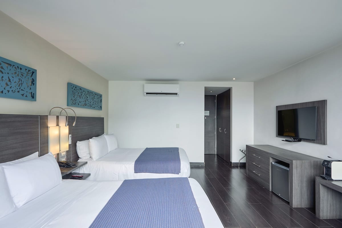 Ropa de cama de alta calidad y minibar